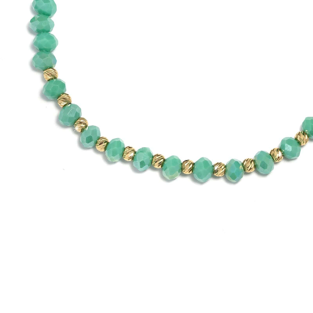 Златна гривна със зелен конец и златни елементи от злато 14к.