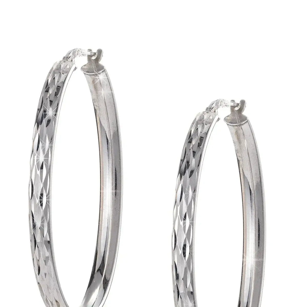 Сребърни дамски обеци халки с фасетирана повърхност