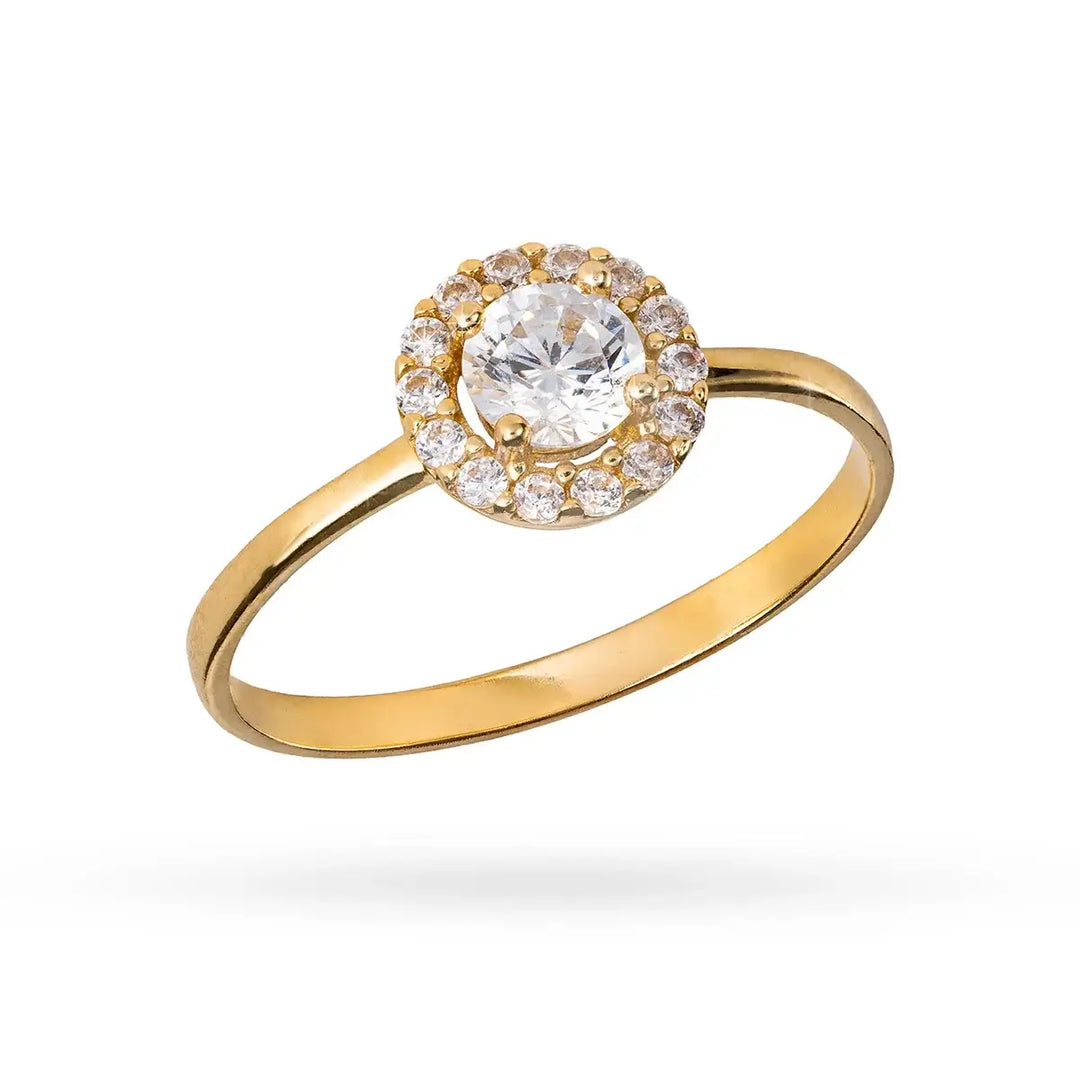 Златен пръстен с централен циркон и обков от малки камъни