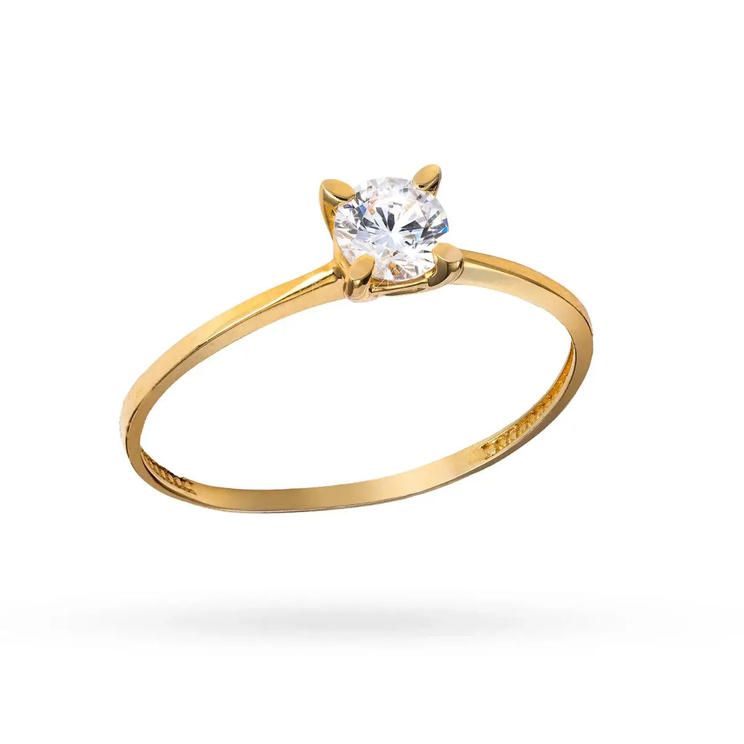 Златен пръстен с централен циркон и извита тънка халка