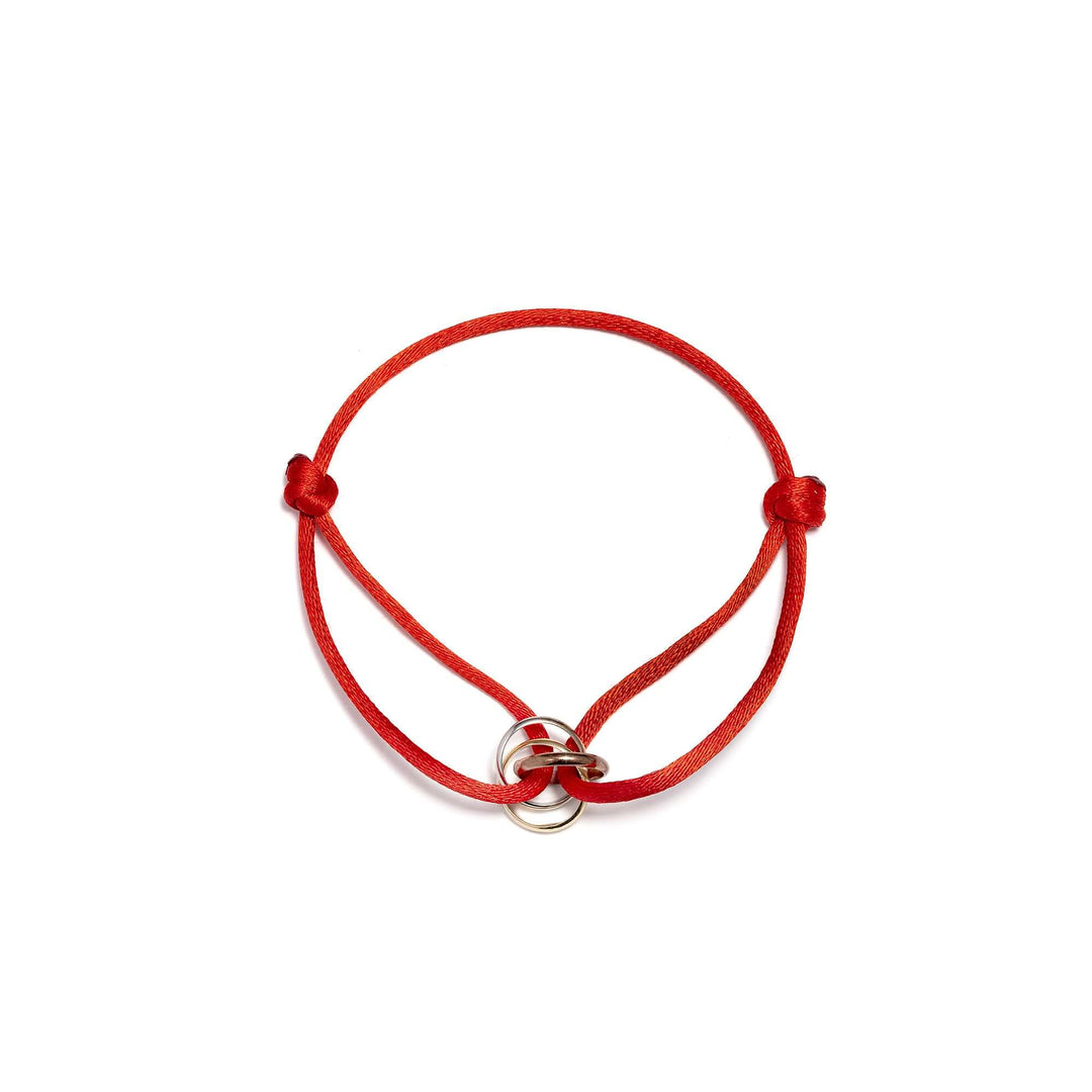 Гривна с червен конец и златни елементи в три цвята злато. Senso Gold