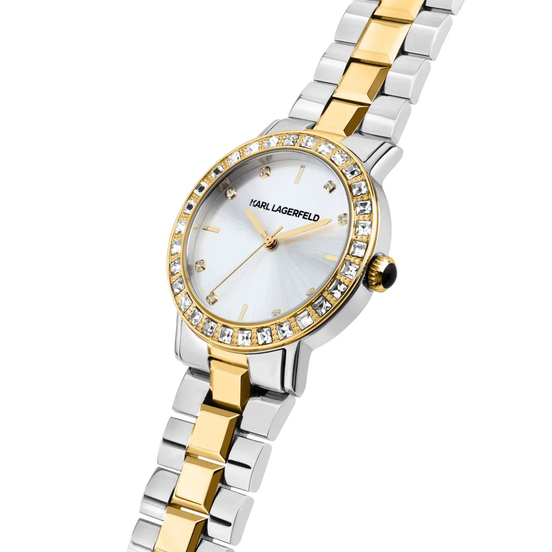 Дамски часовник Karl Lagerfeld Crystals, детайлен изглед на сребристия sunray циферблат и златистия безел с кристали – модел R0553100509