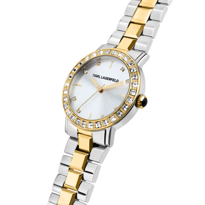 Дамски часовник Karl Lagerfeld Crystals, детайлен изглед на сребристия sunray циферблат и златистия безел с кристали – модел R0553100509