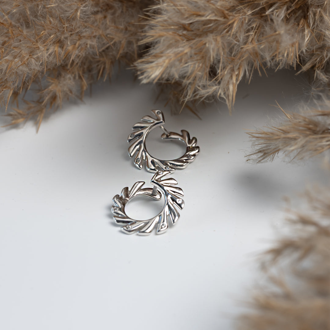 Дамски сребърни обеци с кръгъл дизайн и нежни циркони. RE1047