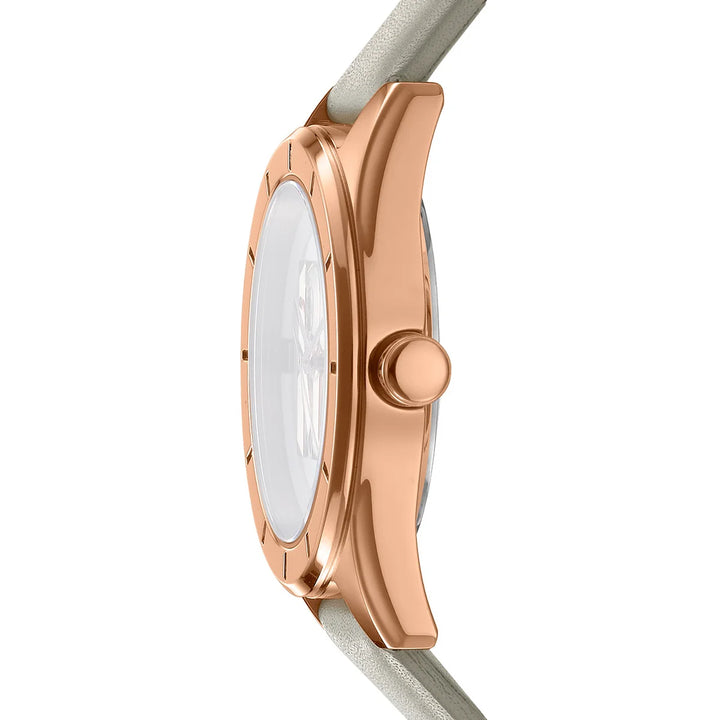 Профил на DKNY Chambers Midi – тънък розовозлатист корпус (~8.2 мм) и минерално стъкло, модел DK1L016L0035